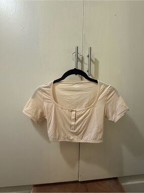 SKIMS nude cropped under shirt